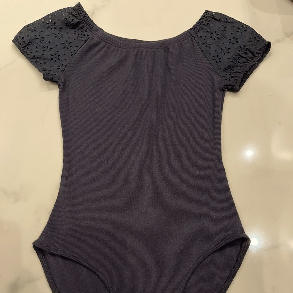 Black bodysuit with flower holed sleeves!